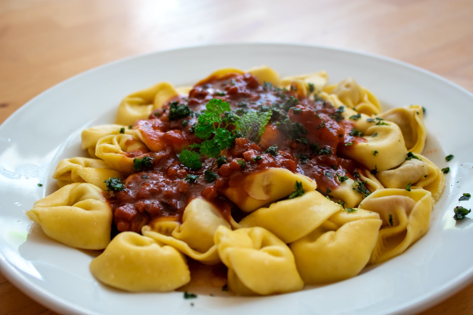 What is the ring-shaped pasta stuffed with cheese or meat called? - Answered