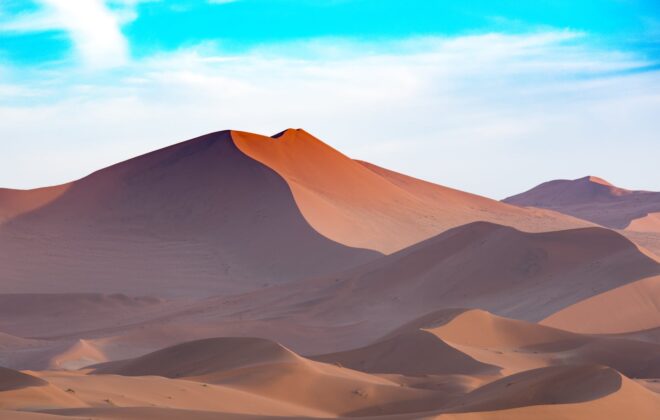 scenic view of desert against sky